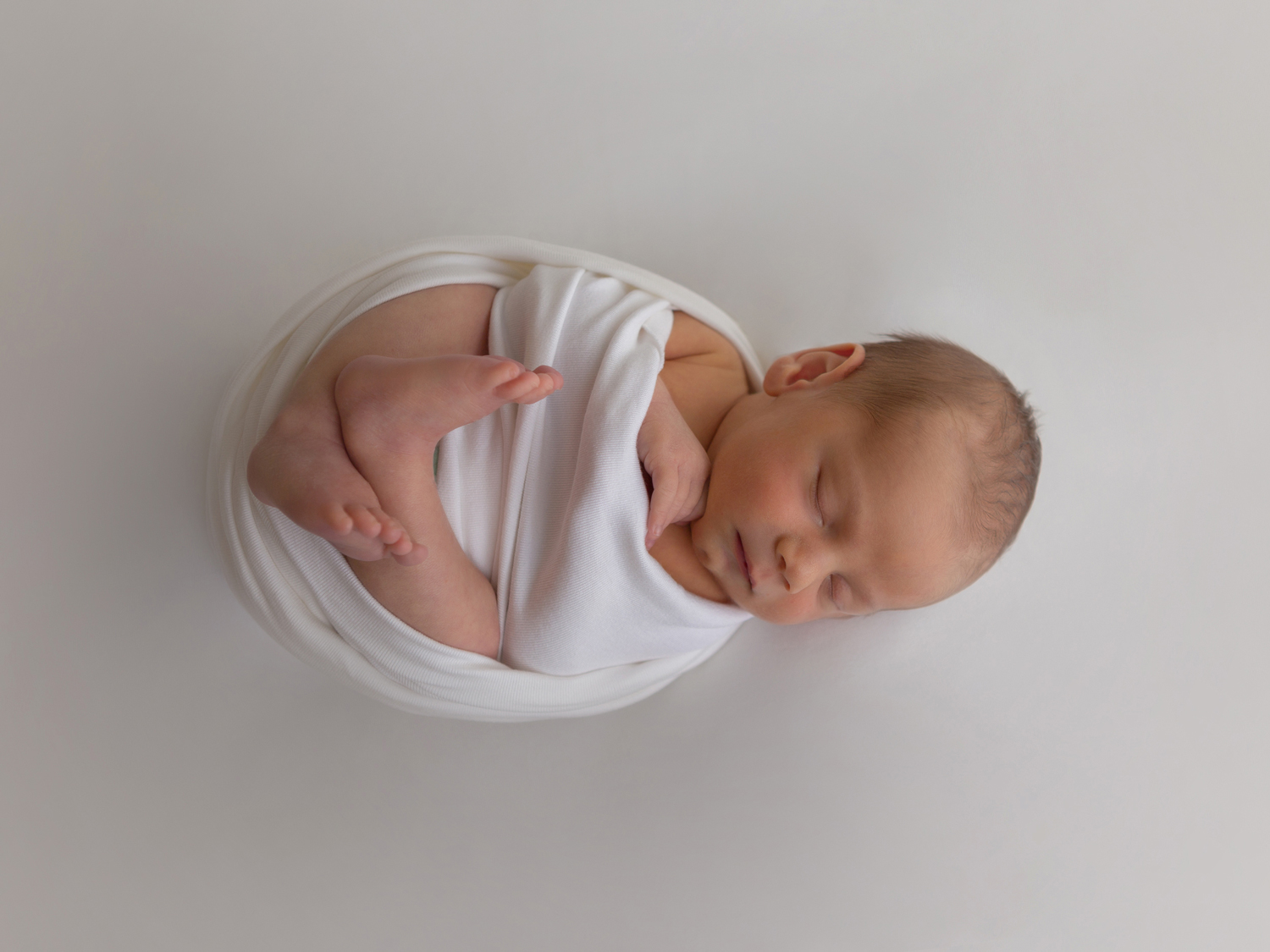 Bebé enrrollado - Sesión recién nacido Cartagena